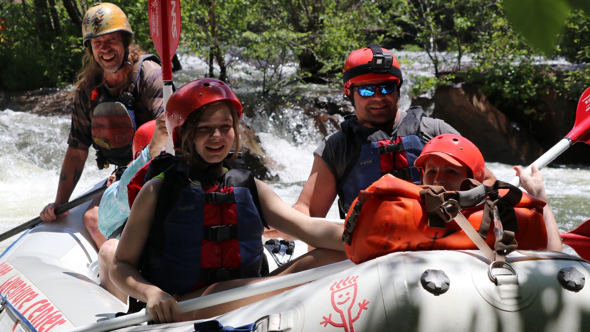 Family of four rafting with Ocoee River guide Fast Fred Ruddock