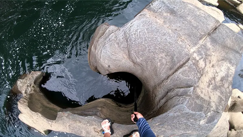 Table Saw rapid view of Prudential looking into the hole towards the sieve below on the Ocoee River