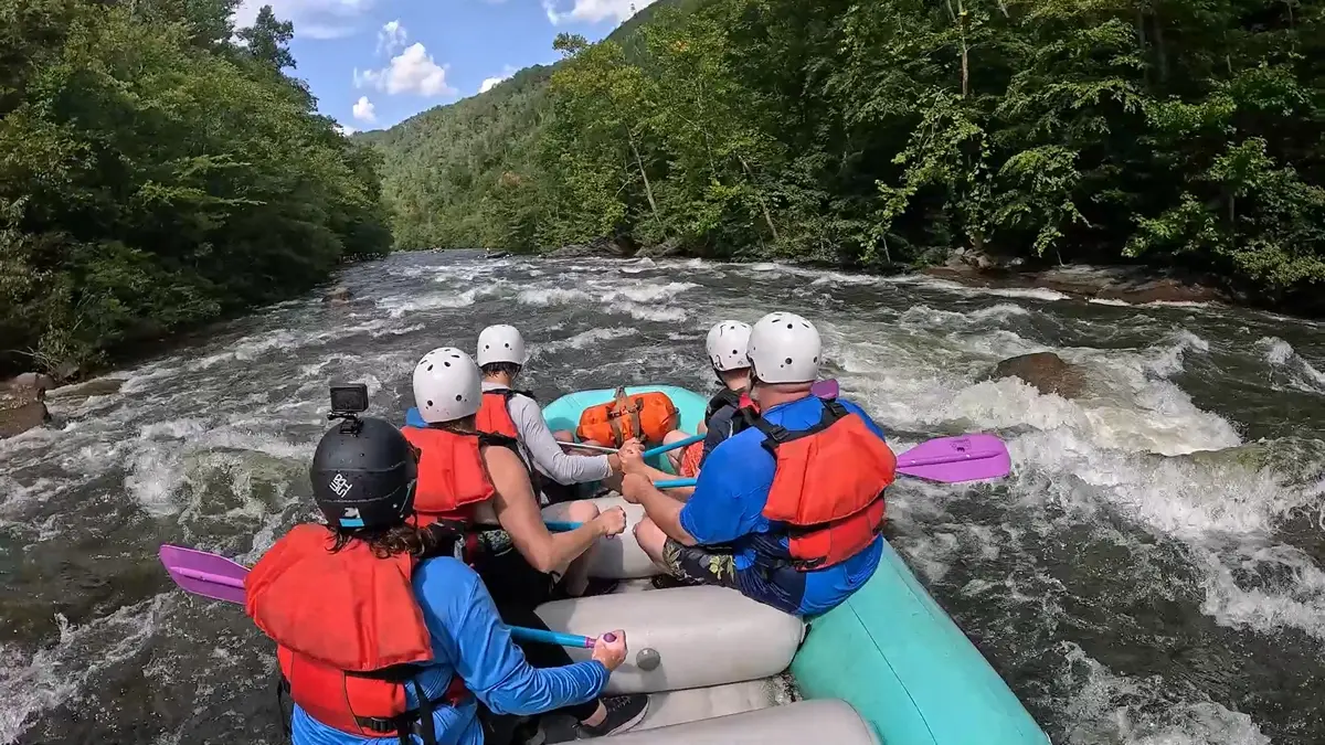 Fast Fred guiding his raft well left of the pin rocks of Dixie Drive Rapid