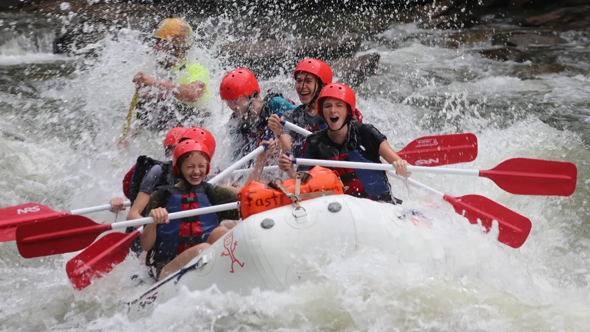 Fast Fred's raft hitting the standing waves sideways at Double Trouble Rapid