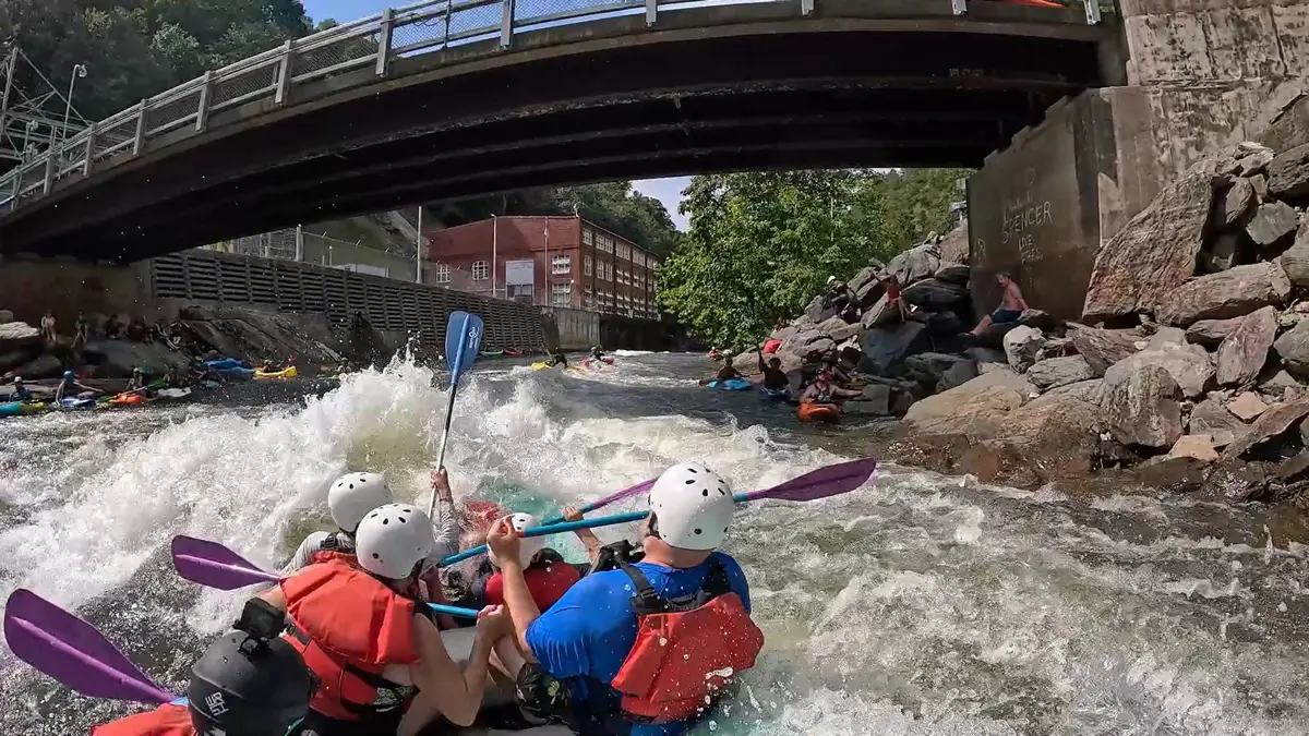 Raft navigating the powerful wave at Hell Hole and the final drop at Powerhouse