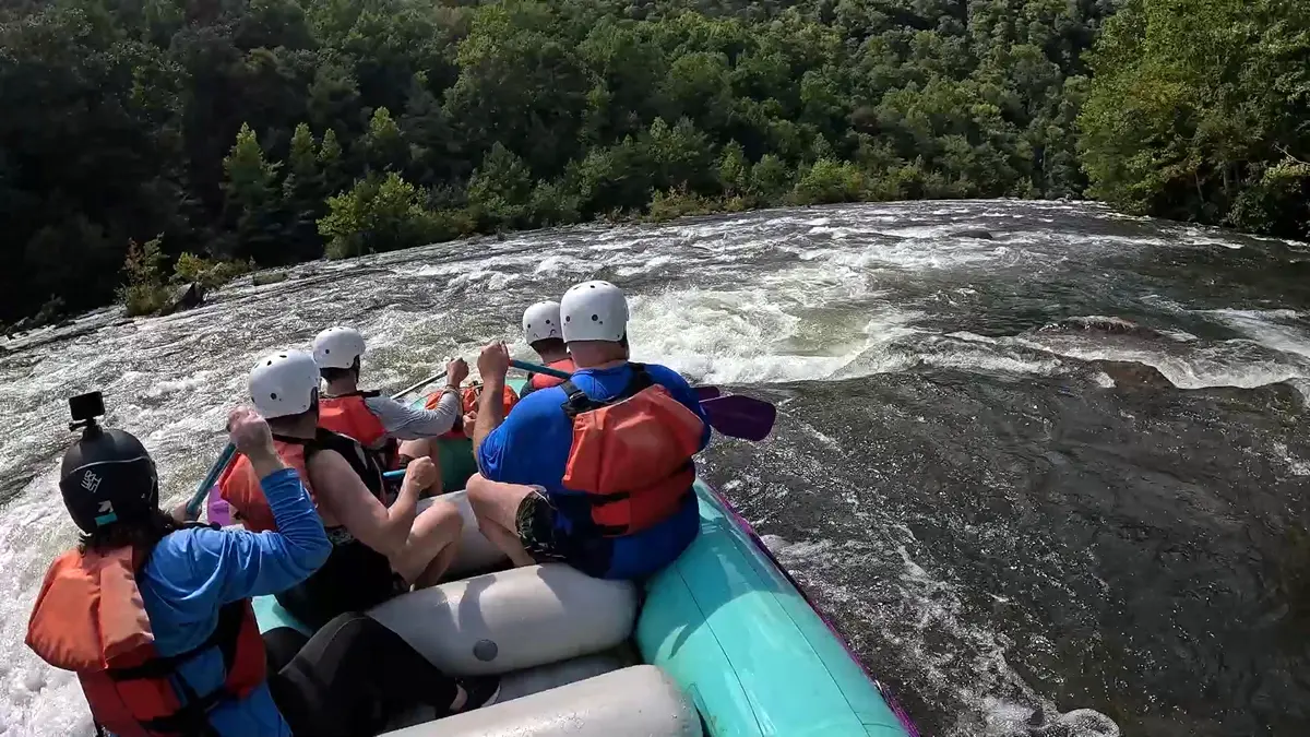 Raft navigating the boogie water and technical gates of Hell's Half Mile