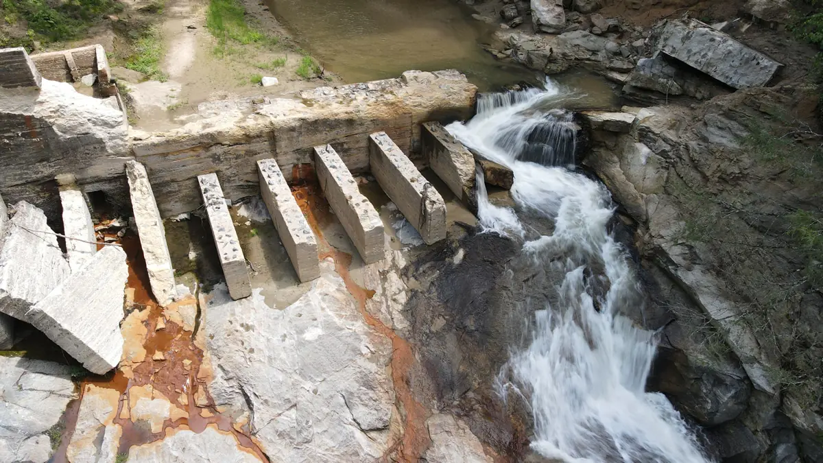 Aerial view of the destroyed Big Hungry Dam in the Green River Cove after Hurricane Helene