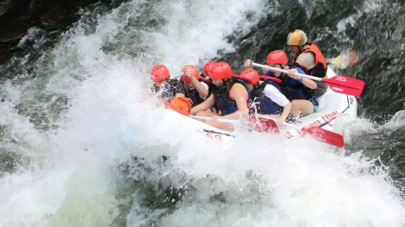 Family of four rafting with Ocoee River guide Fast Fred Ruddock
