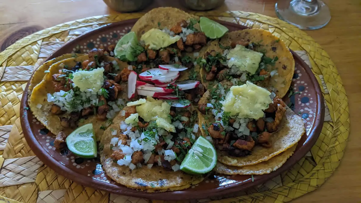 Traditional Mexican Tacos al Pastor served at a local eatery in Baños de Agua Santa, Ecuador