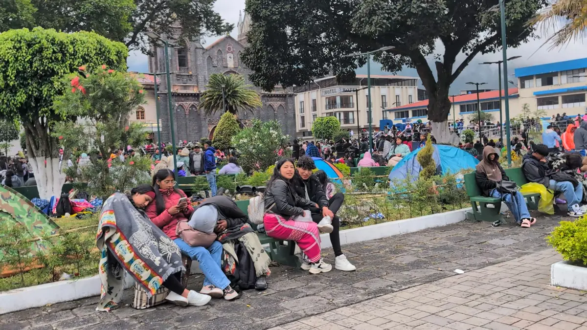 Pilgrims walking during the Walk of Faith (Caminata de la Fe) towards Baños de Agua Santa, Ecuador.