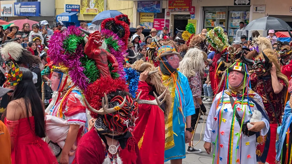 Intricate devil masks and traditional costumes at the Diablada Pillareña festival in Píllaro, Ecuador