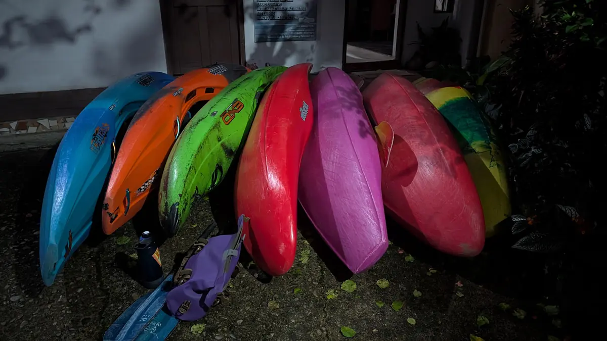 Whitewater kayaks lined up for the Jondachi Fest race near Tena, Ecuador