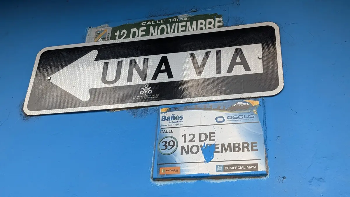 A view of Calle 12 de Noviembre sign in Banos de Agua Santa an Ecuadorian city.