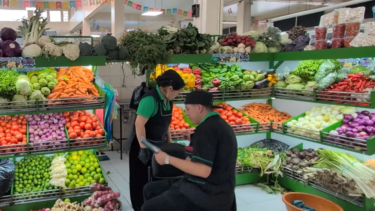 Abundant fresh produce and local vendors at Mercado Central in Quito, Ecuador