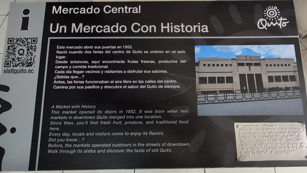 Historical information plaque at Mercado Central in Quito, detailing its founding in 1952.