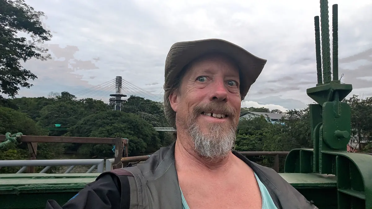 Fast Fred crossing the footbridge in Tena, Ecuador, the gateway town to the Amazon rainforest.