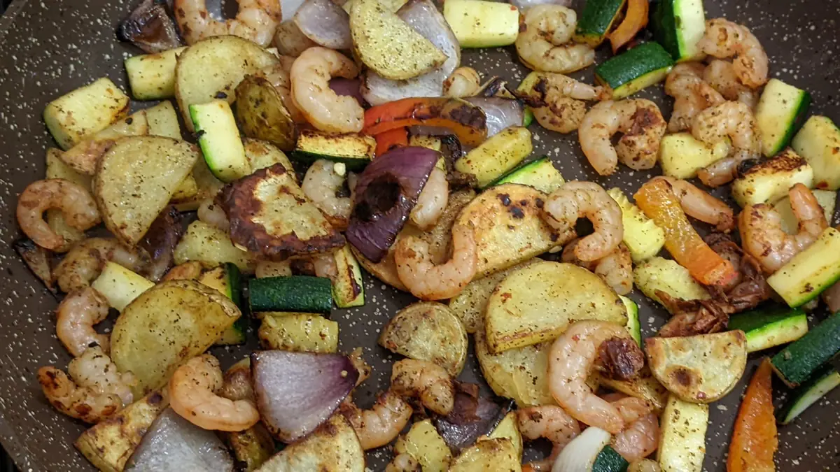 A fresh shrimp and vegetable dish, showcasing the healthy and affordable dining options available when following the 'real economy' travel philosophy.