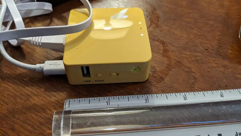 Portable travel router and hardware firewall for digital nomads