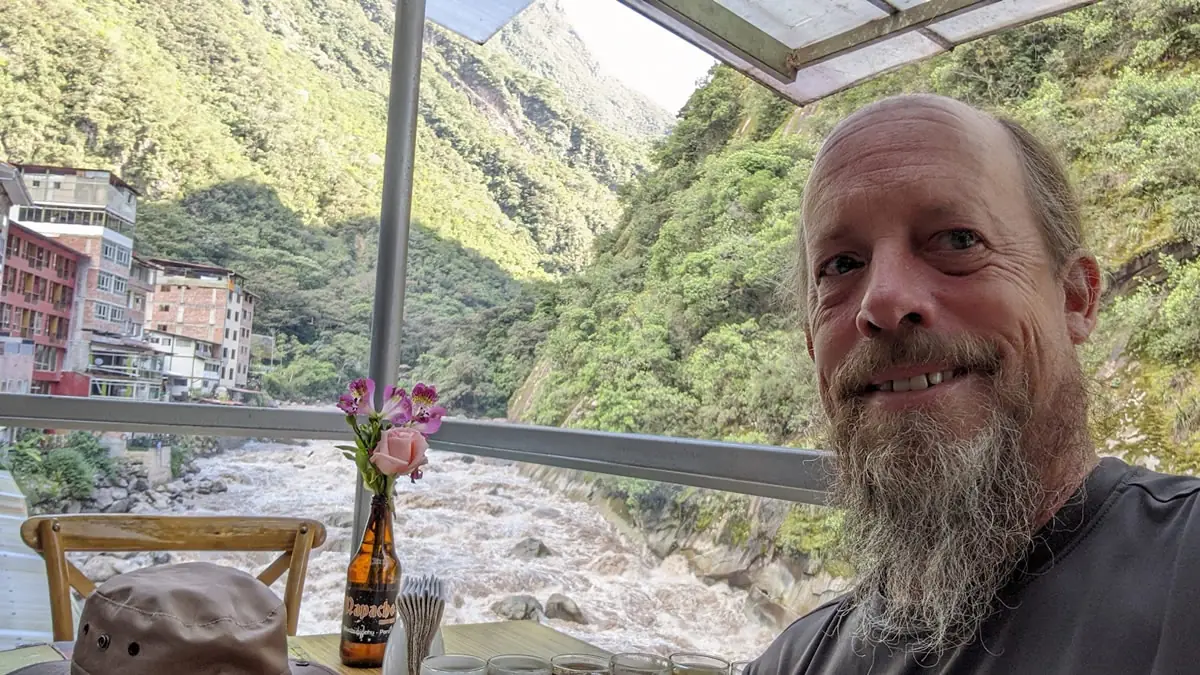 Fast Fred enjoying a local craft beer at a tavern in Aguas Calientes, the gateway town to Machu Picchu, Peru.