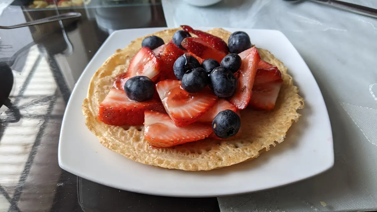 A generous, free breakfast plate included with a local B&B stay, demonstrating how to secure value and frugality while traveling.